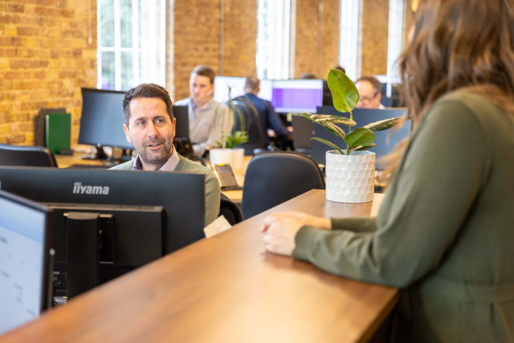 Team in the office at their desks