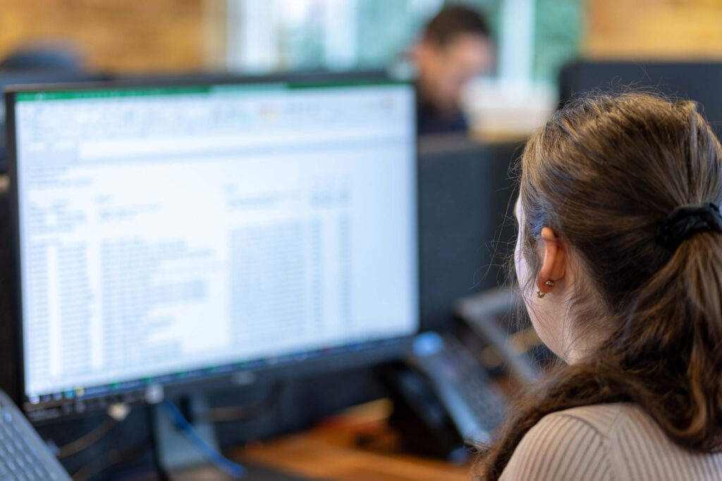 Team in the office at their desks